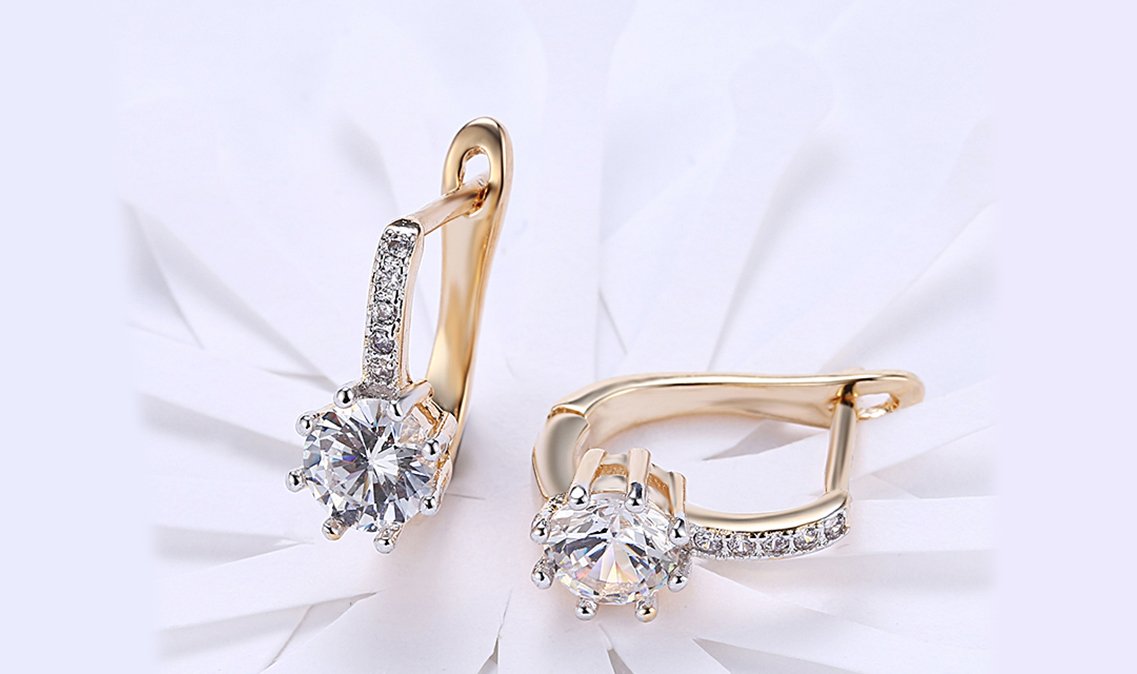 Elegant 14K Gold Plating Starburst Leverback Earrings featuring Austrian elements in white and blue options.