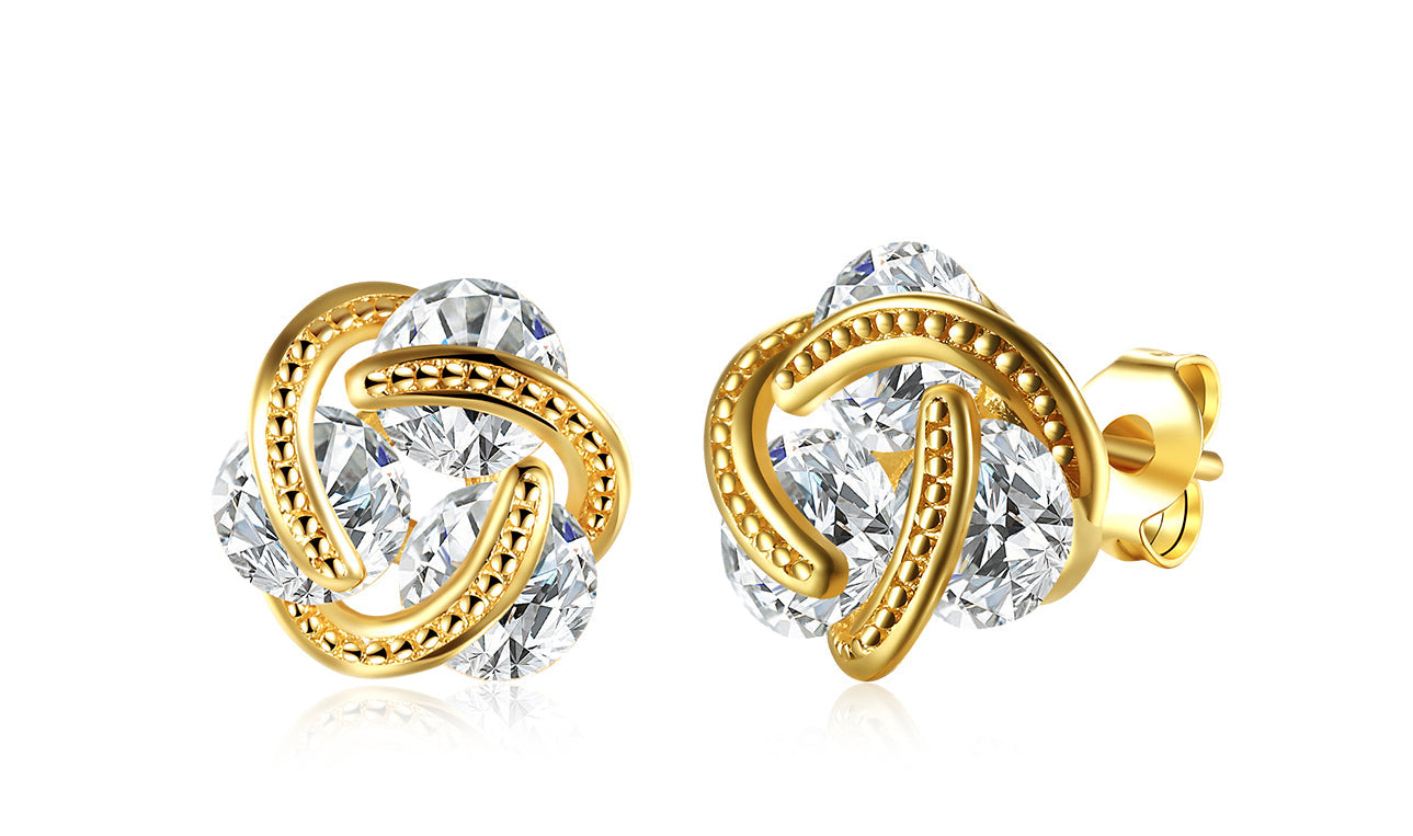 Elegant 14K Gold Plating Twisted 3-Stone Stud Earrings in gold, showcasing their intricate design and sparkling stones.