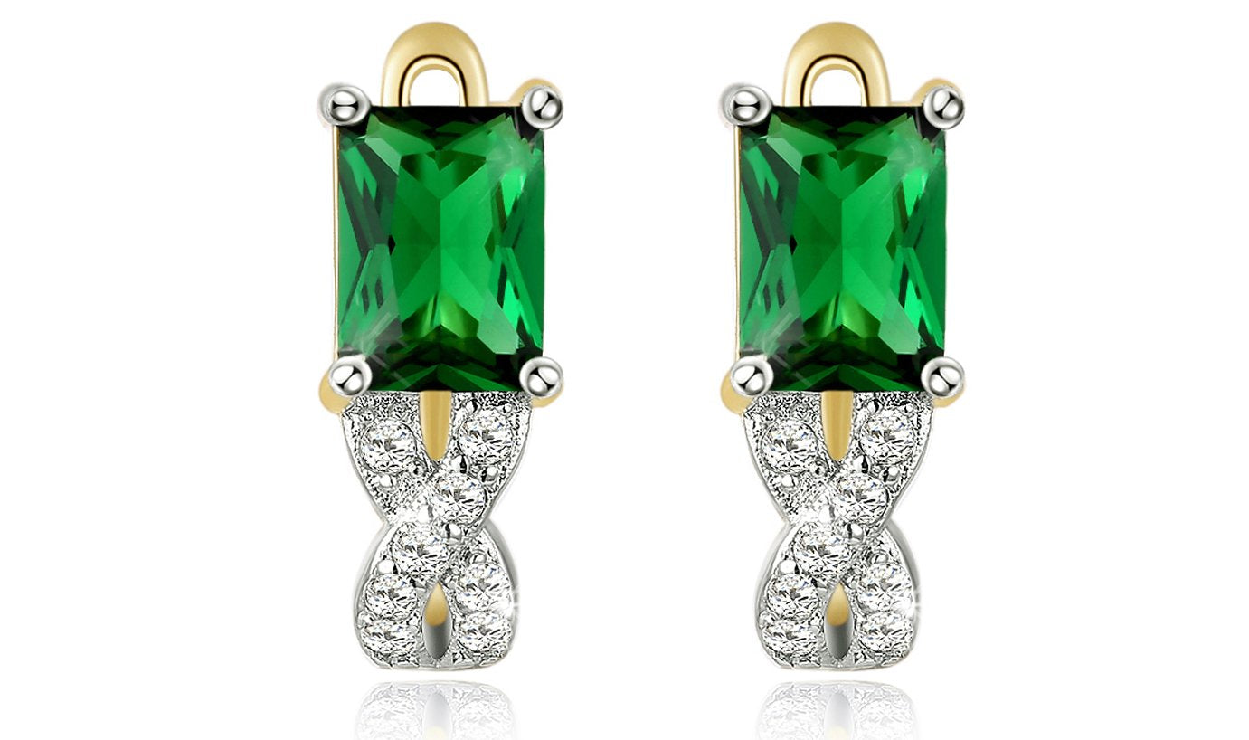 Elegant 14K gold plated lever back earrings featuring emerald cut green stones in a twisted pav'e design.