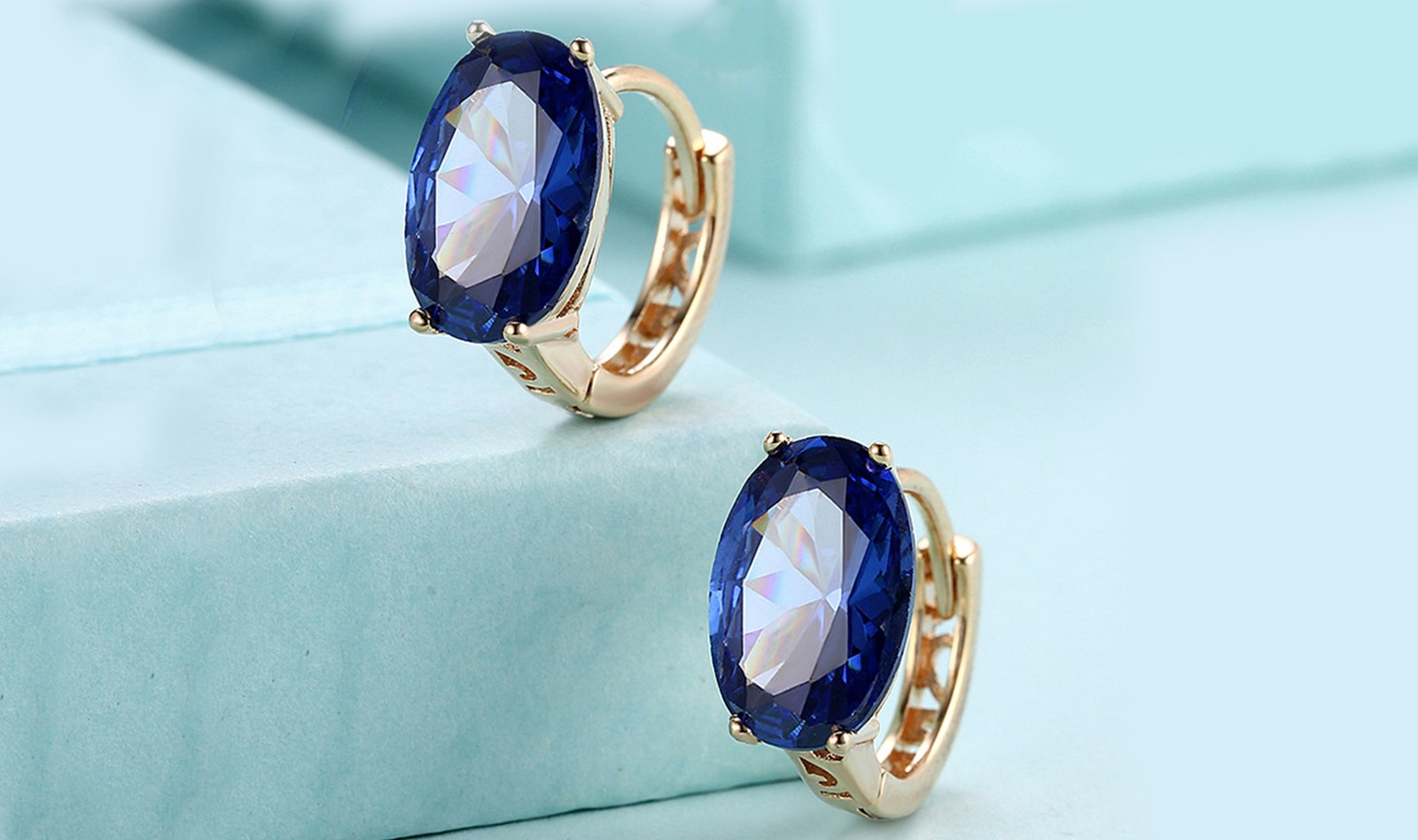 Elegant 14K Gold Plating Large Diamond Cut Clip On Earrings in purple and blue options, showcasing their stunning design and craftsmanship.