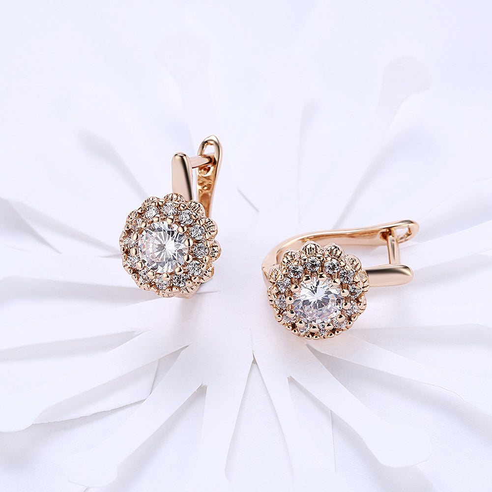 Elegant 14K Gold Plating Large Floral White Pav'e Huggies featuring sparkling princess cut stones.