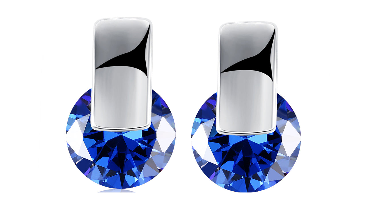 Elegant 14K white gold plated earrings featuring a stunning blue sapphire stone, perfect for any occasion.