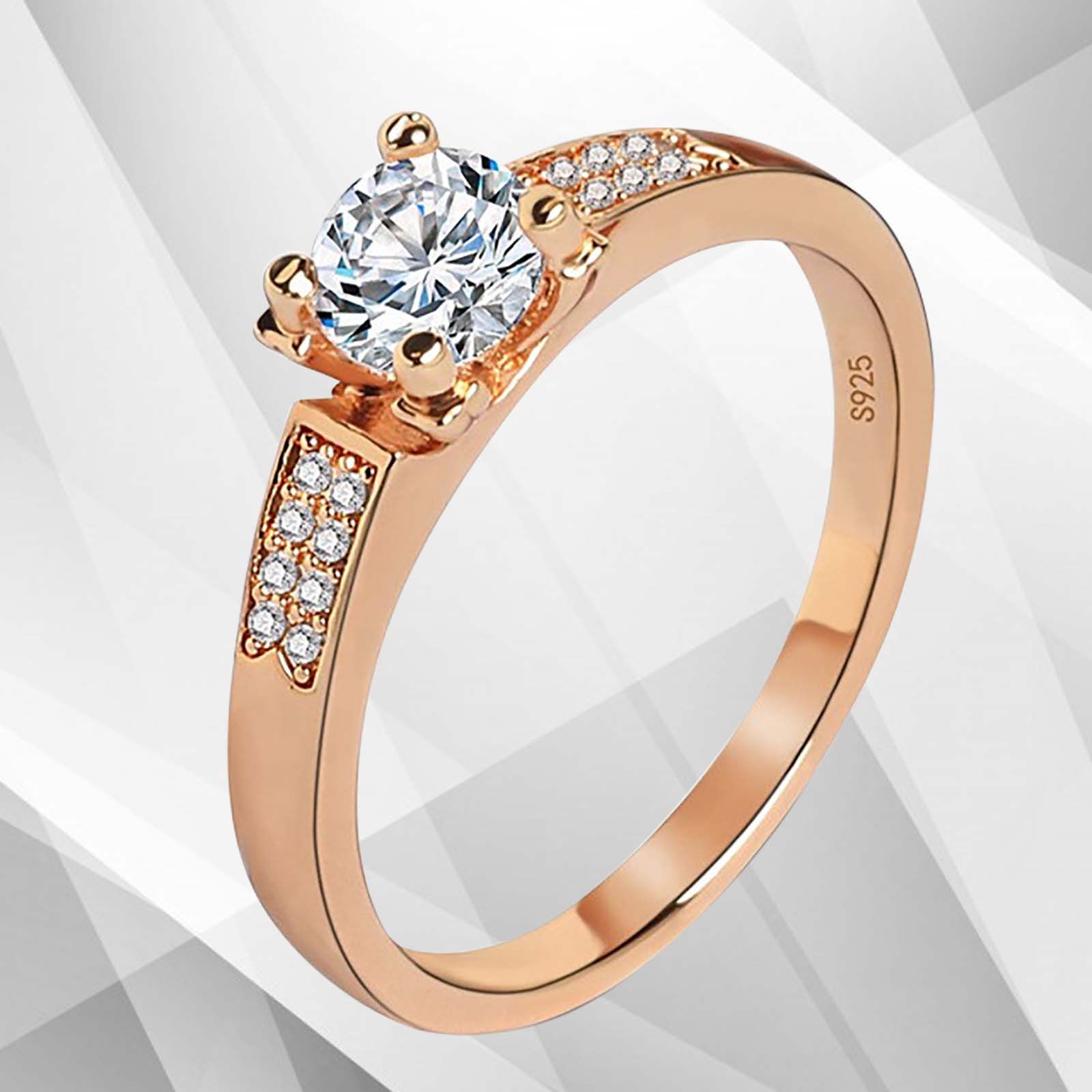 1.68Ct Round-Cut CZ Diamond Solitaire Bridal Engagement Ring in 18Ct Rose Gold with a contemporary 6 claw prong setting.