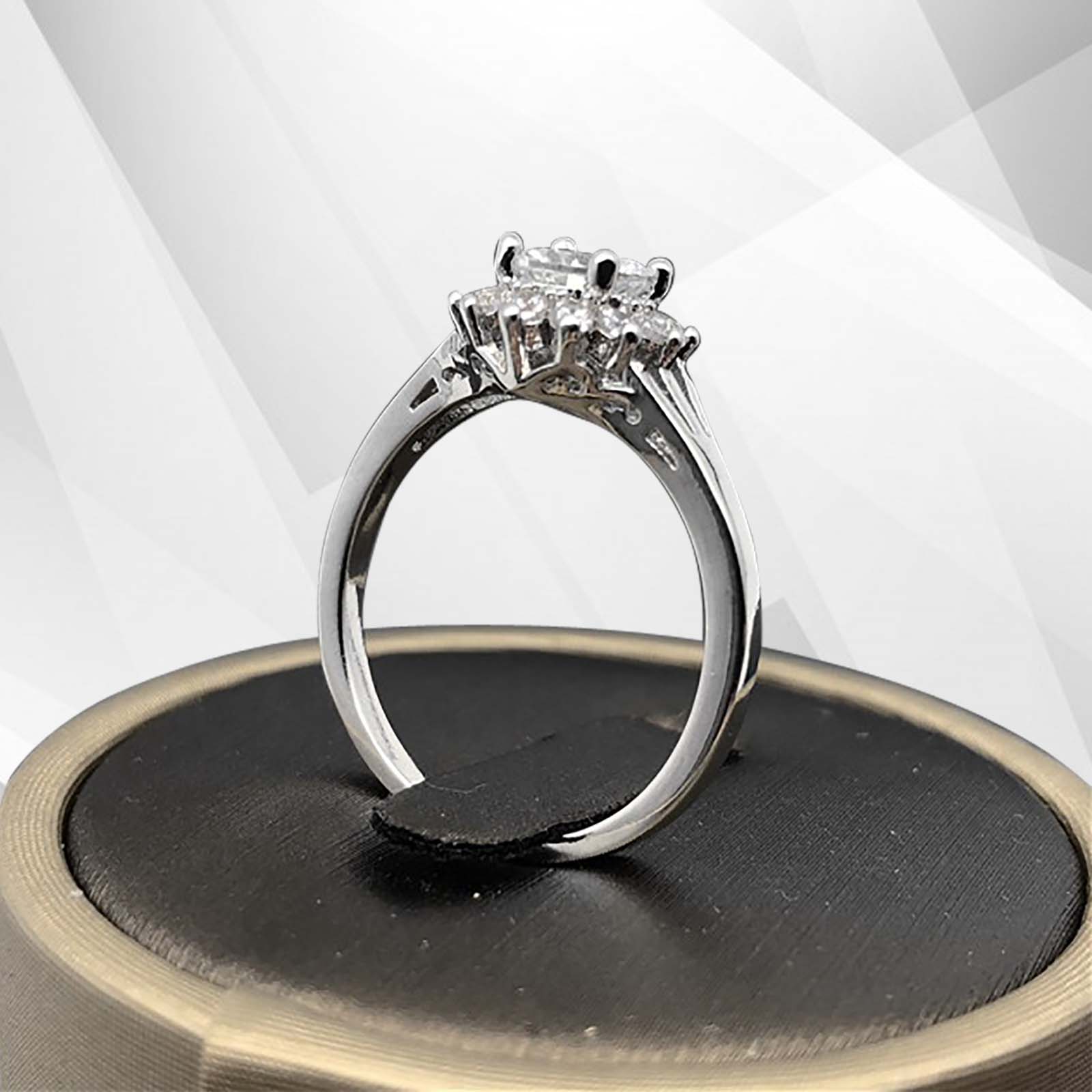 1.8Ct Round-Cut Diamond Cushion Halo Bridal Engagement Ring in 18K white gold, featuring a sparkling central diamond surrounded by a halo of smaller stones.