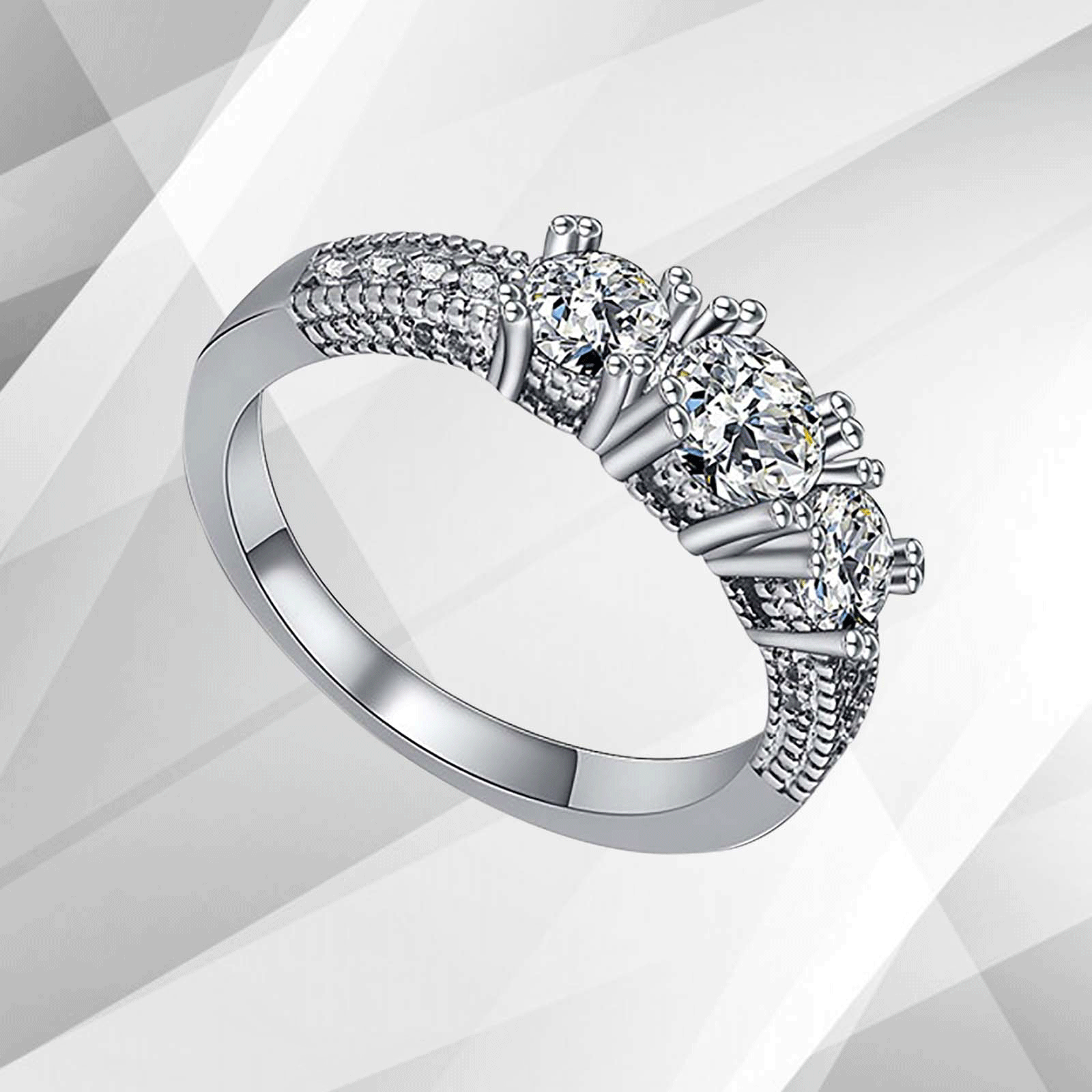 1.8Ct Round-Cut Diamonds Three Stones Bridal Engagement Ring in 18K White Gold, showcasing its elegant design and sparkling diamonds.