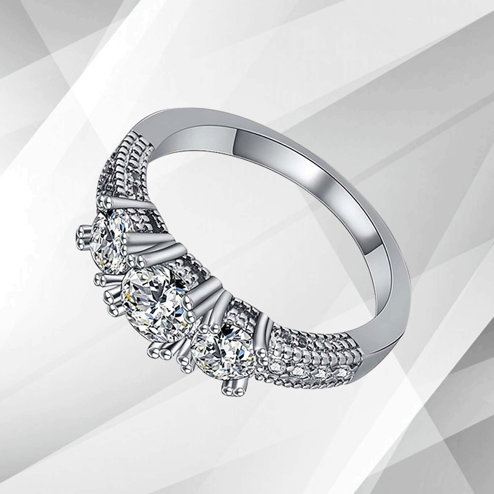 1.8Ct Round-Cut Diamonds Three Stones Bridal Engagement Ring in 18K White Gold, showcasing its elegant design and sparkling diamonds.