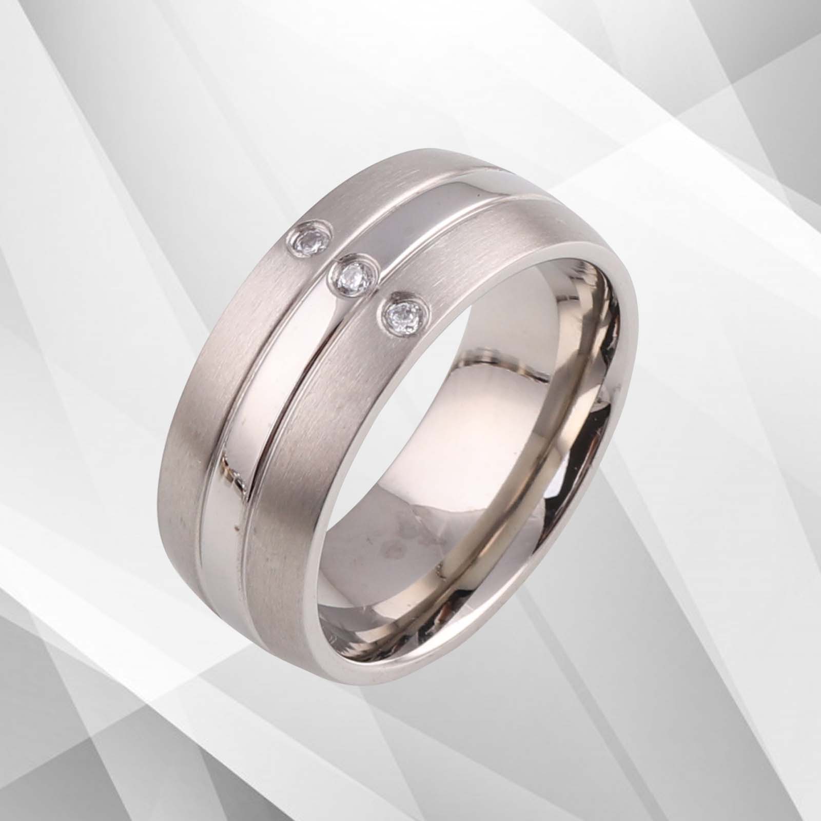 18Ct White Gold Over Titanium Engagement Band featuring three 0.35Ct CZ diamonds, showcasing a trendy design with a matt and sparkling finish.