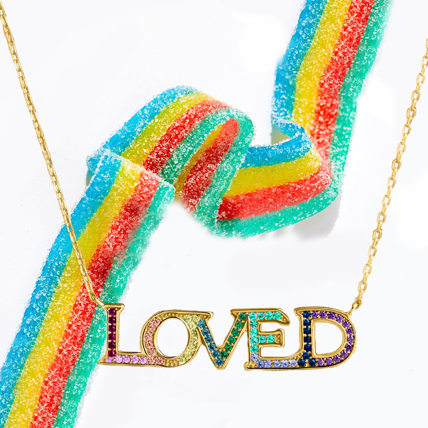 A beautiful 18K gold plated necklace featuring a rainbow elements pendant, showcasing vibrant colors and a stylish link chain.