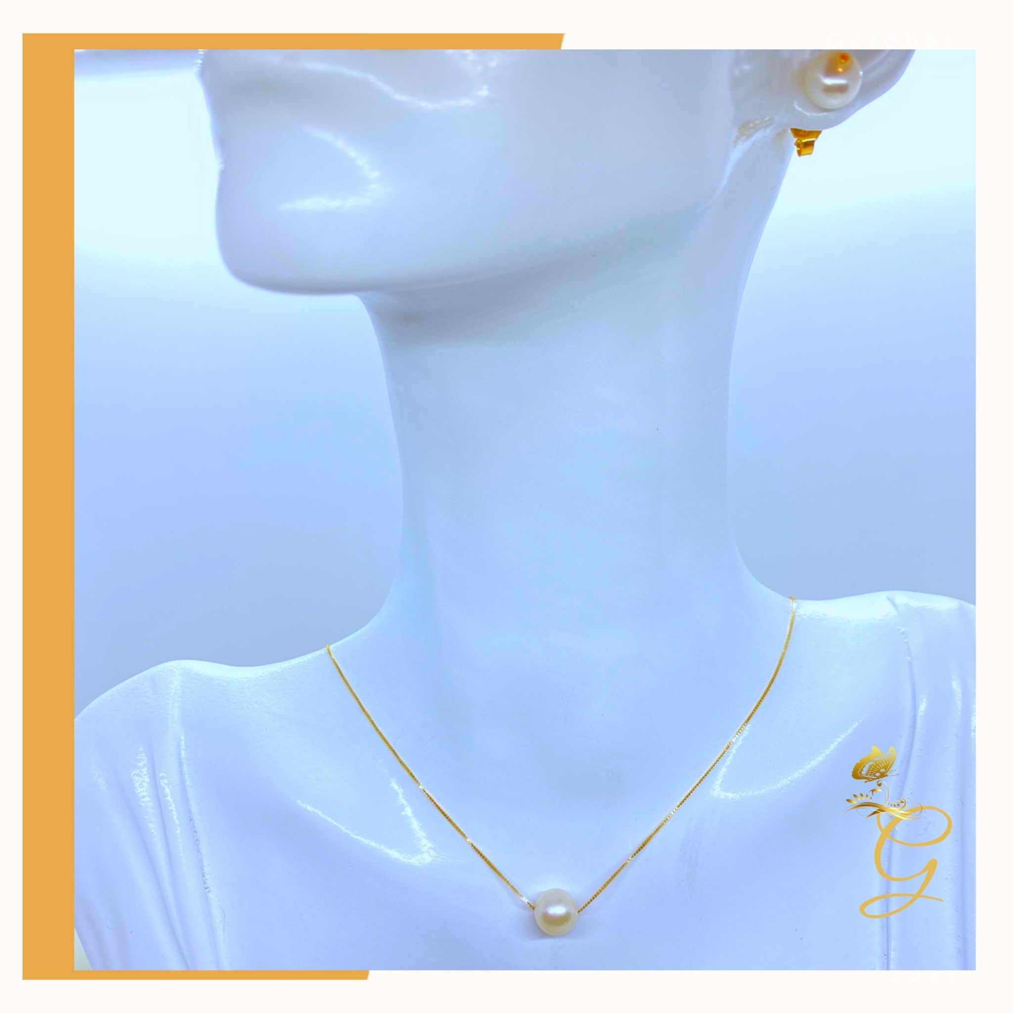 Elegant 18K real gold jewelry set featuring white pearl earrings and an 18-inch necklace, showcasing luxury and sophistication.