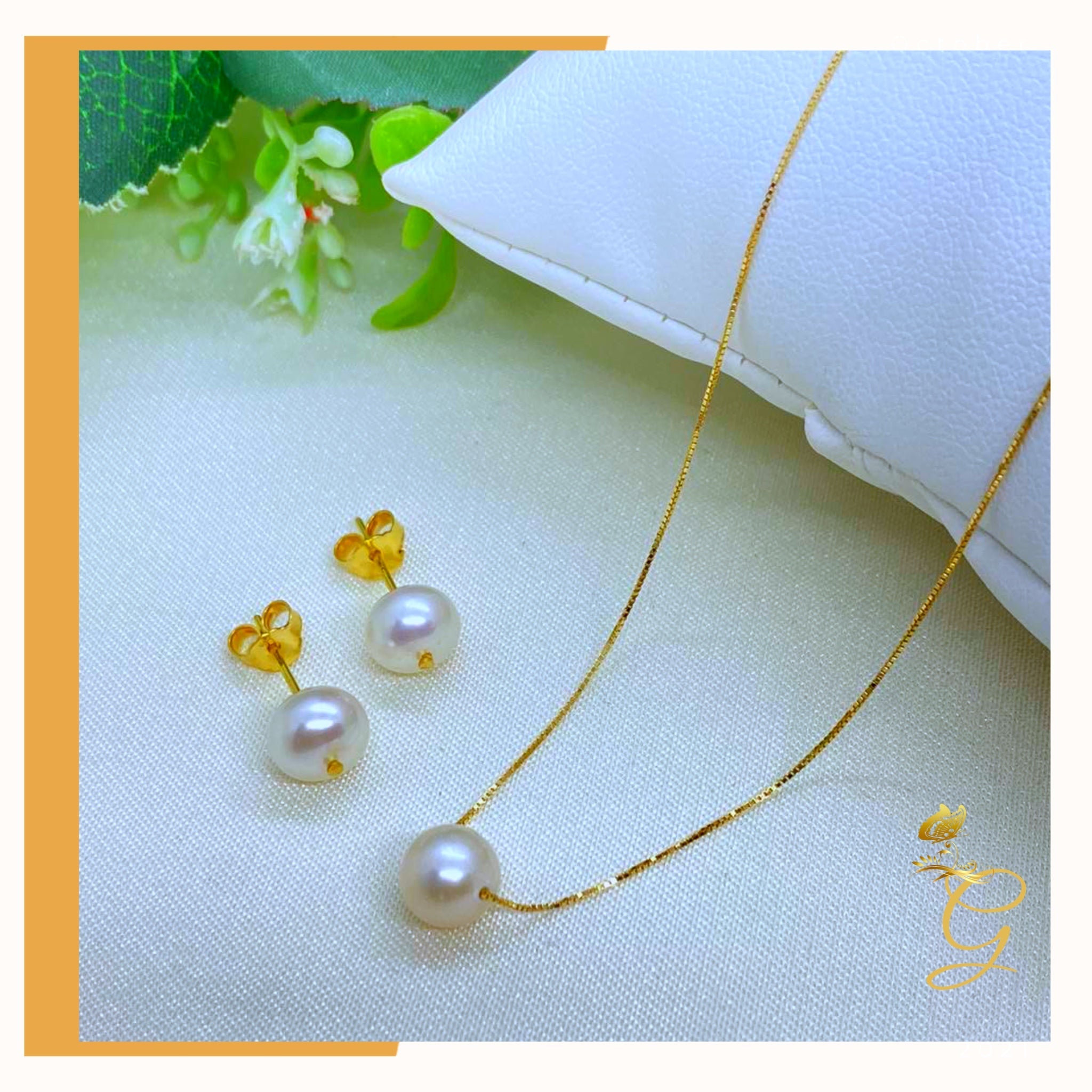 Elegant 18K real gold jewelry set featuring white pearl earrings and an 18-inch necklace, showcasing luxury and sophistication.