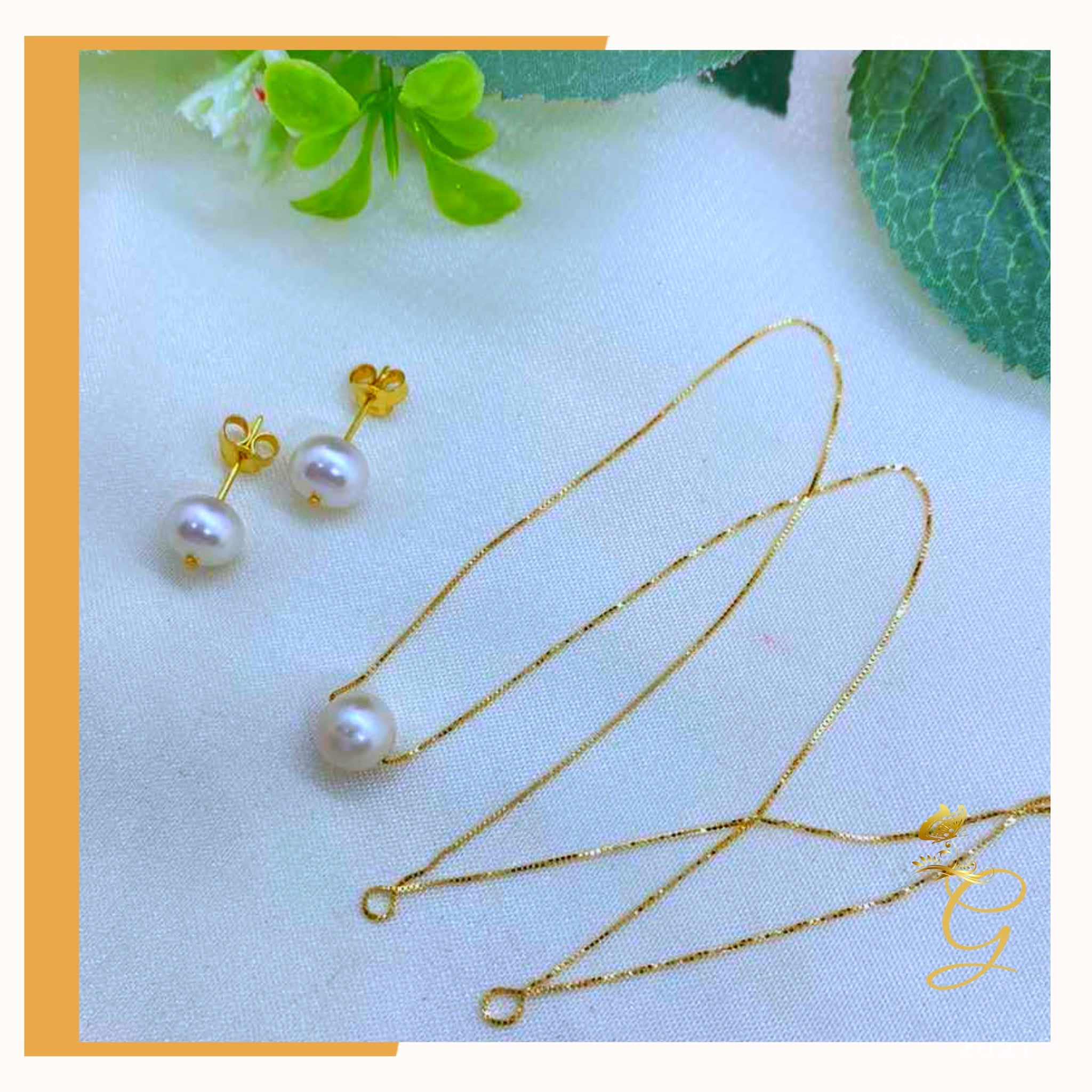 Elegant 18K real gold jewelry set featuring white pearl earrings and an 18-inch necklace, showcasing luxury and sophistication.