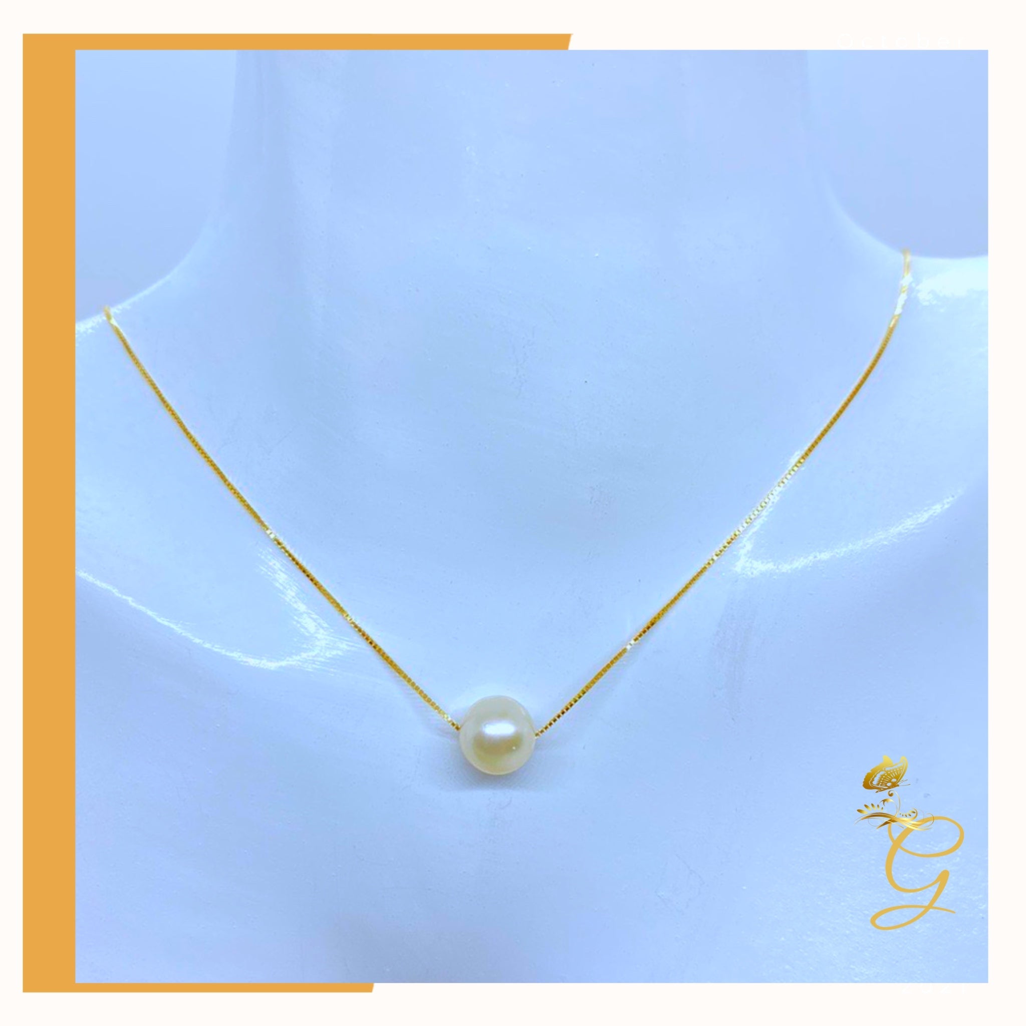 Elegant 18K real gold jewelry set featuring white pearl earrings and an 18-inch necklace, showcasing luxury and sophistication.