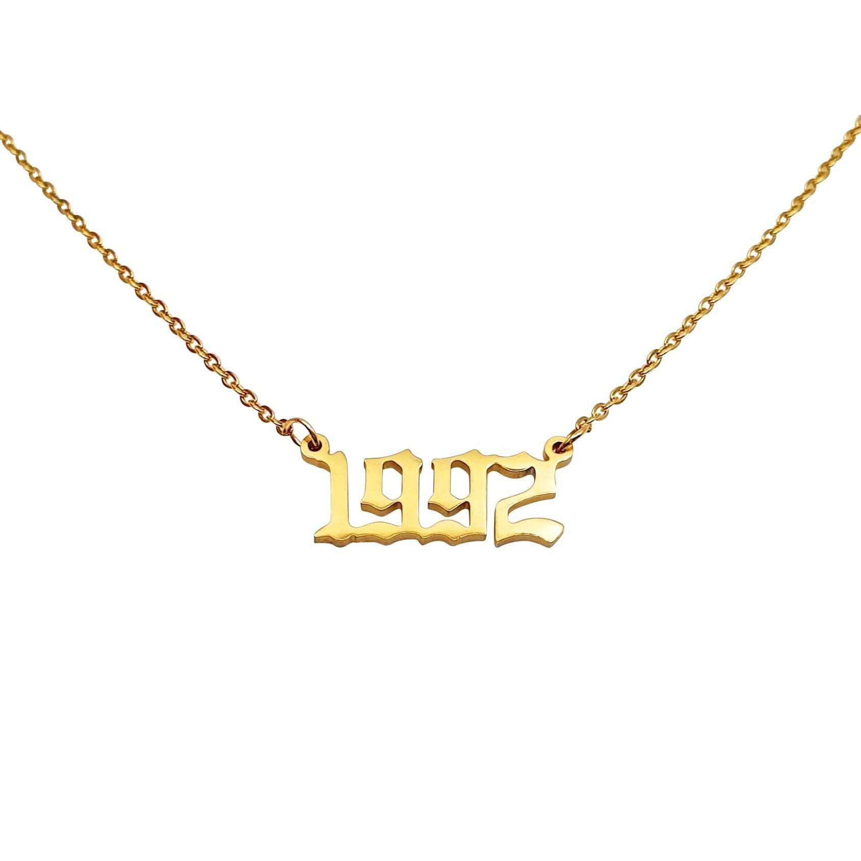 A stylish 1992 Year Necklace made of tarnish-free stainless steel, available in gold and silver, showcasing a bold 2cm pendant on an 18-inch chain.