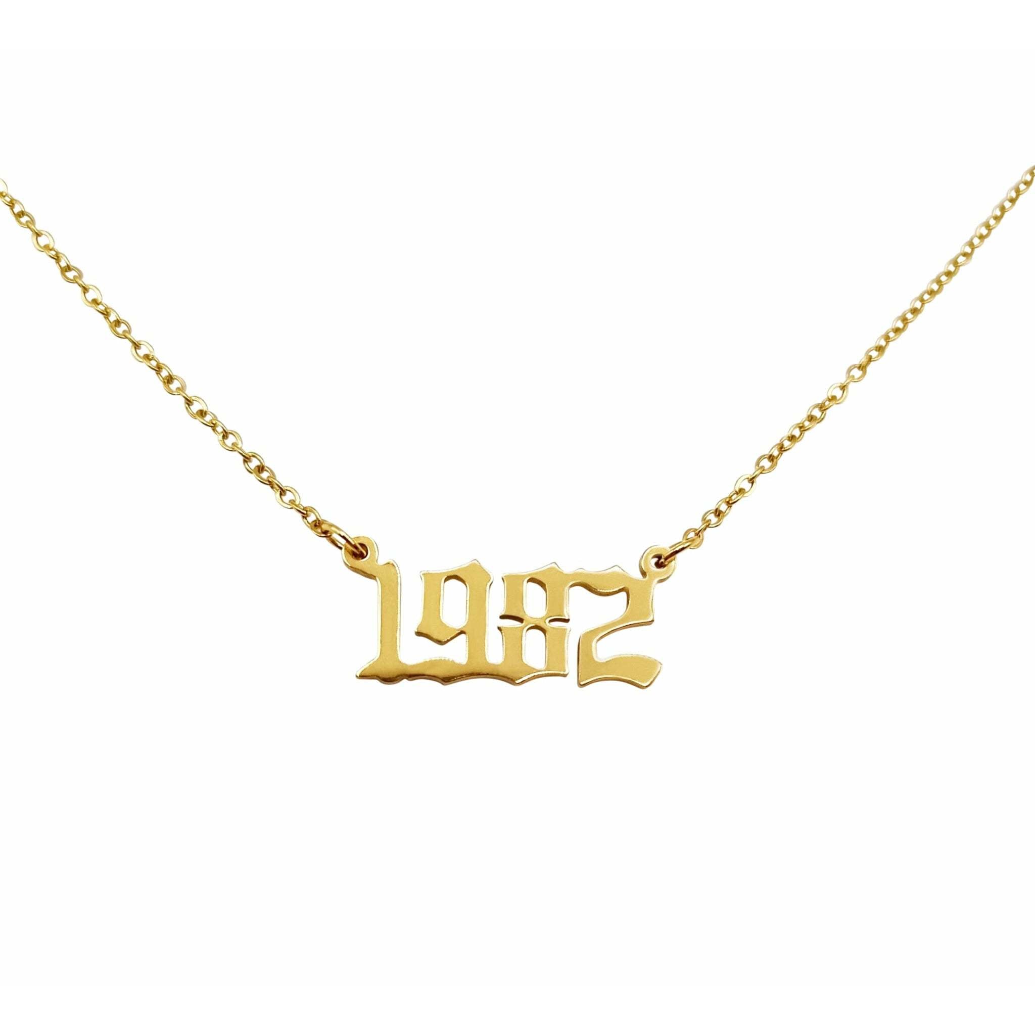 A stylish 1982 Year Necklace made of tarnish-free stainless steel, available in gold and silver finishes, featuring a 2cm pendant on an 18-inch chain.