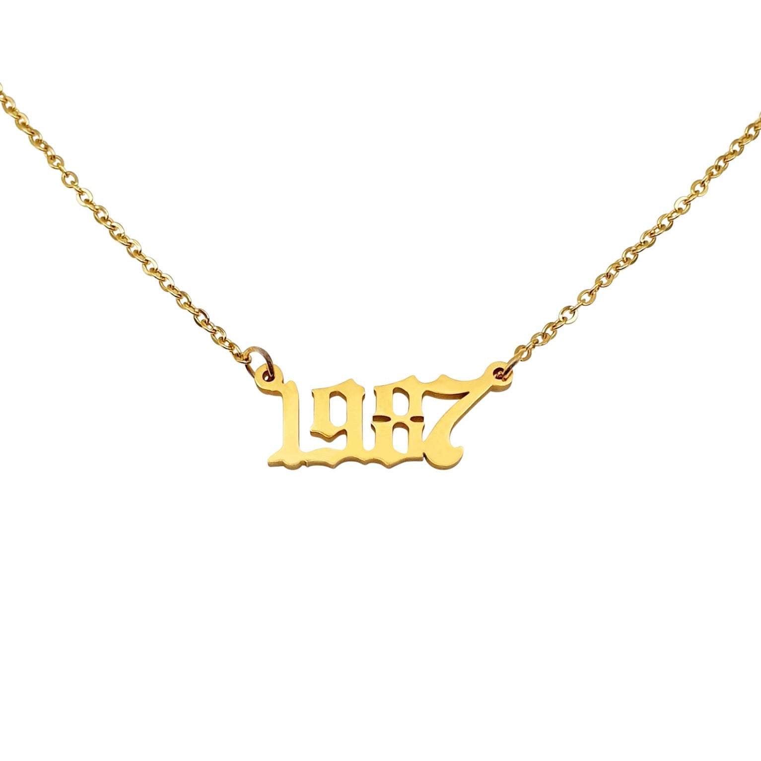 Elegant 1987 Year Necklace in tarnish-free stainless steel, available in gold and silver plating, showcasing its stylish design.