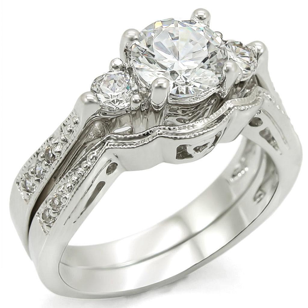 1W002 Rhodium Brass Ring featuring a clear AAA Grade CZ stone, elegantly designed with a shiny finish.