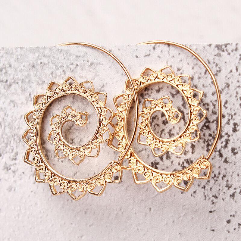 A pair of modern 14K gold plated multi filigree heart swirl hoop earrings, showcasing intricate designs and a luxurious finish.