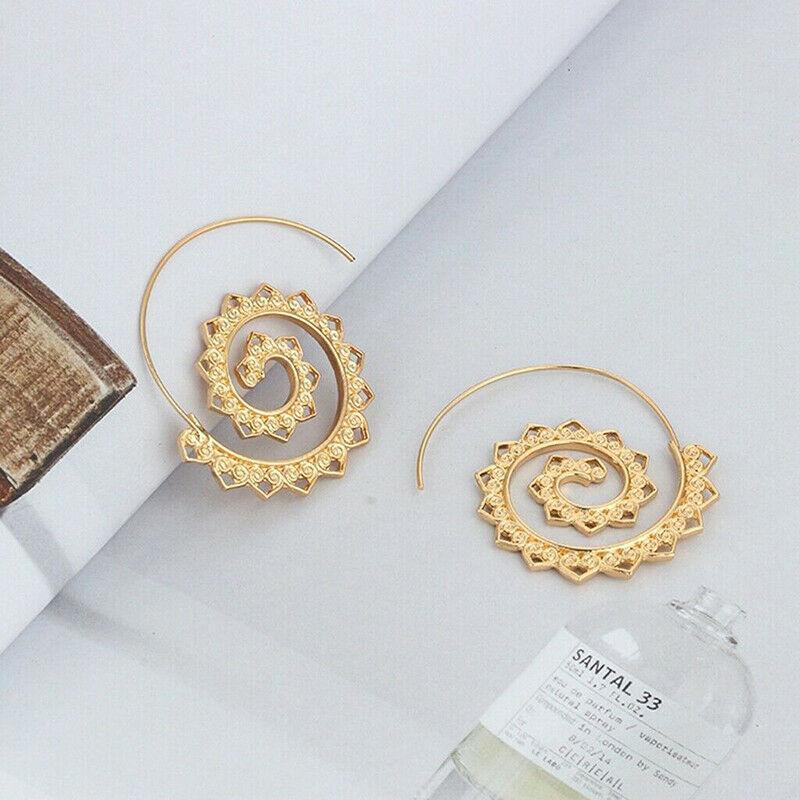 A pair of modern 14K gold plated multi filigree heart swirl hoop earrings, showcasing intricate designs and a luxurious finish.