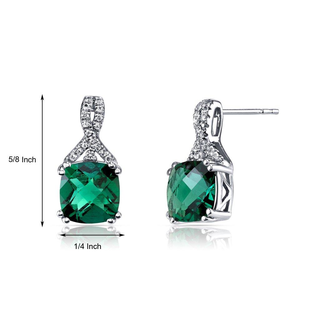 Elegant 2.00 CT cushion cut emerald stud earrings set in 18K white gold plating, showcasing their vibrant color and luxurious design.