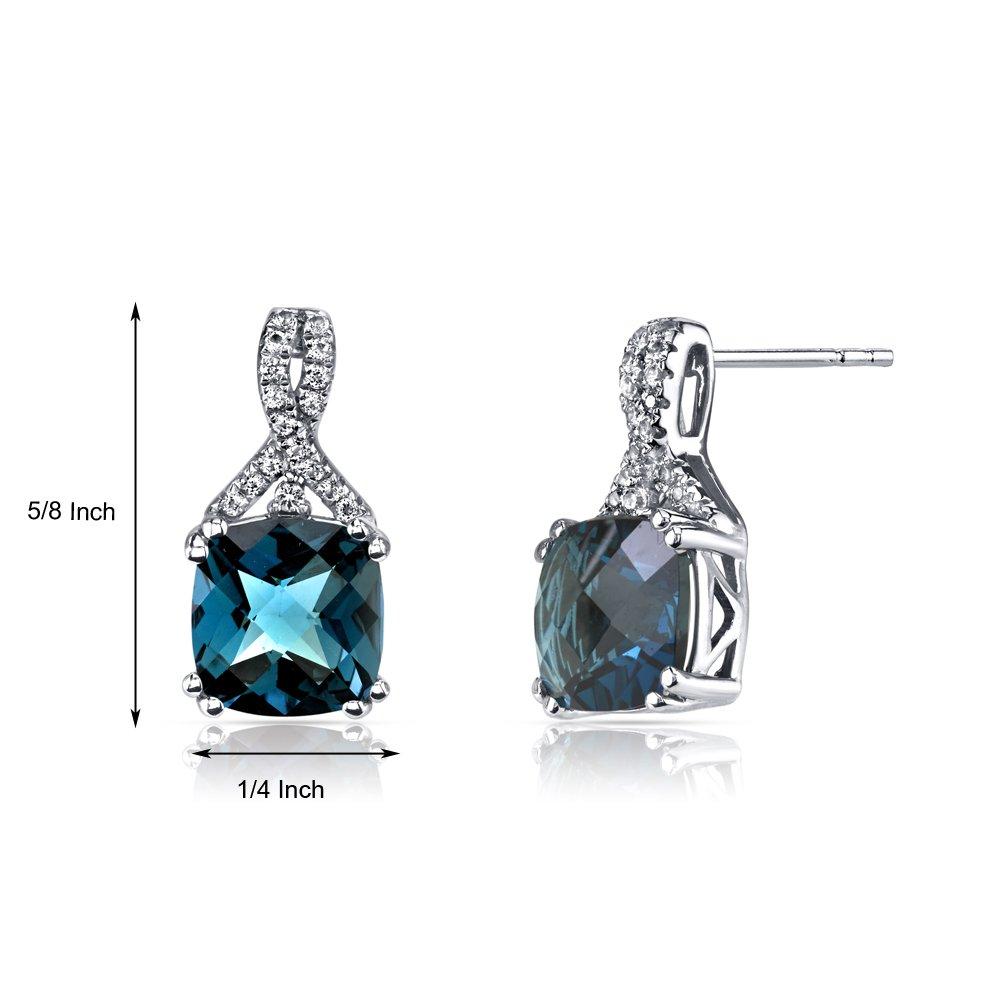 Elegant 2.00 CT cushion cut London Blue Topaz stud earrings set in 18K white gold, showcasing their brilliant blue color and luxurious design.