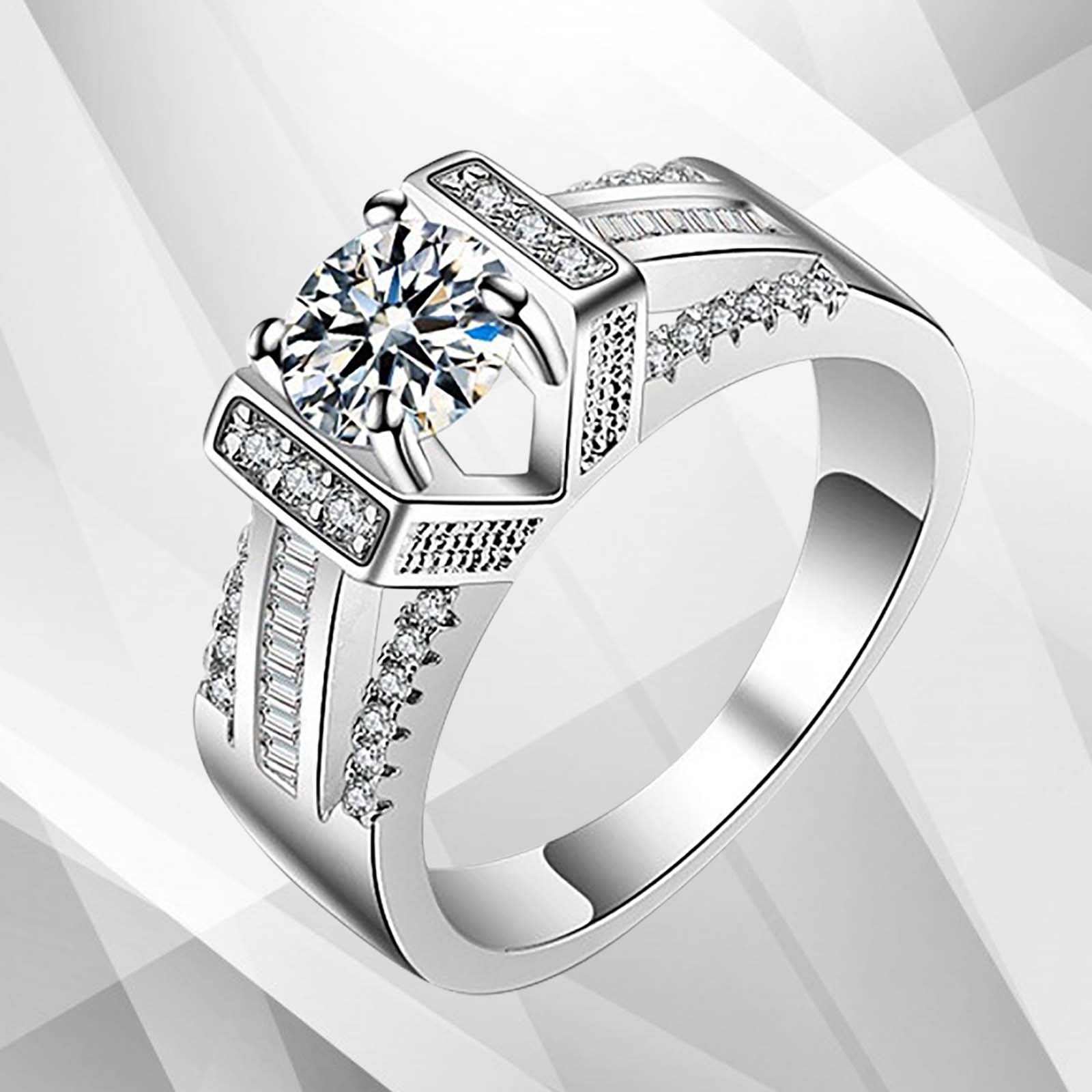 Elegant 2.0Ct round-cut CZ diamond solitaire engagement ring in 18Ct white gold setting, showcasing its brilliant sparkle and pave settings.