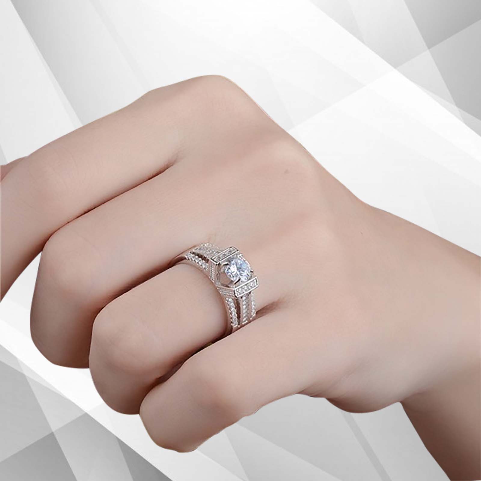 Elegant 2.0Ct round-cut CZ diamond solitaire engagement ring in 18Ct white gold setting, showcasing its brilliant sparkle and pave settings.