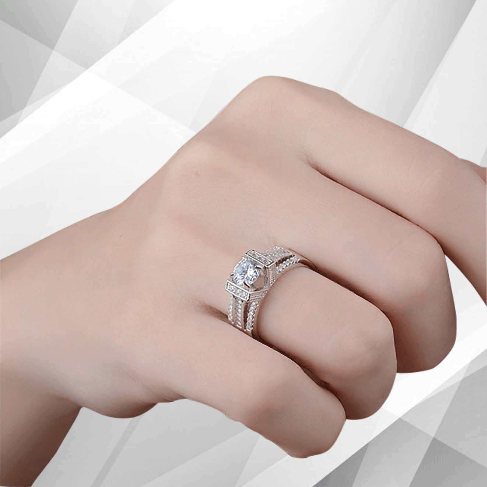 Elegant 2.0Ct round-cut CZ diamond solitaire engagement ring in 18Ct white gold setting, showcasing its brilliant sparkle and pave settings.