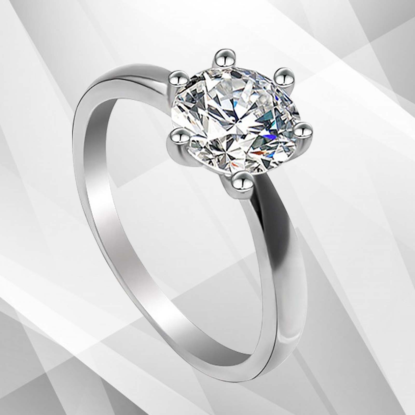 2.0Ct Round-Cut Diamond Solitaire Bridal Engagement Ring in 18Ct white gold, showcasing a brilliant round diamond in a pave setting.