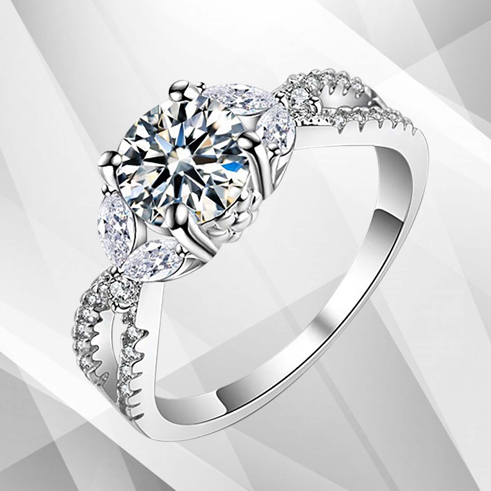 2.5Ct Round-Cut CZ Diamond Solitaire Bridal Engagement Ring set in 18K white gold, showcasing a brilliant diamond in a secure prong setting.