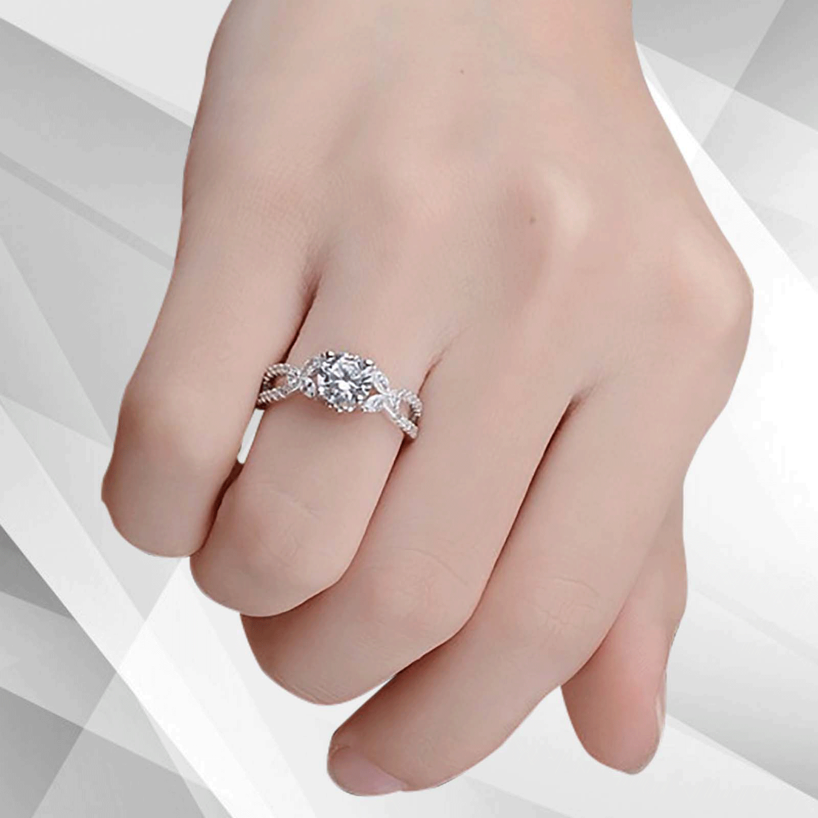 2.5Ct Round-Cut CZ Diamond Solitaire Bridal Engagement Ring set in 18K white gold, showcasing a brilliant diamond in a secure prong setting.