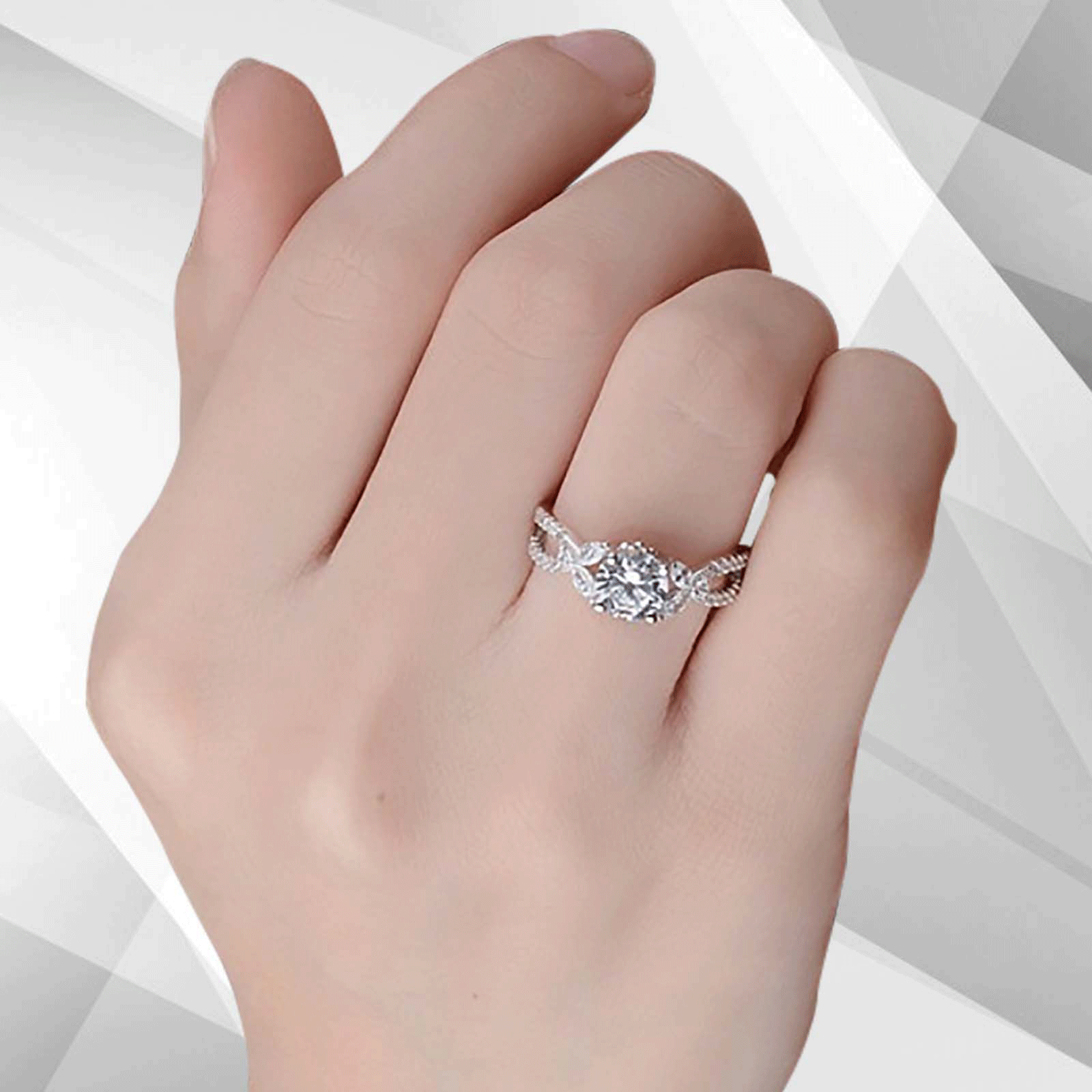 2.5Ct Round-Cut CZ Diamond Solitaire Bridal Engagement Ring set in 18K white gold, showcasing a brilliant diamond in a secure prong setting.