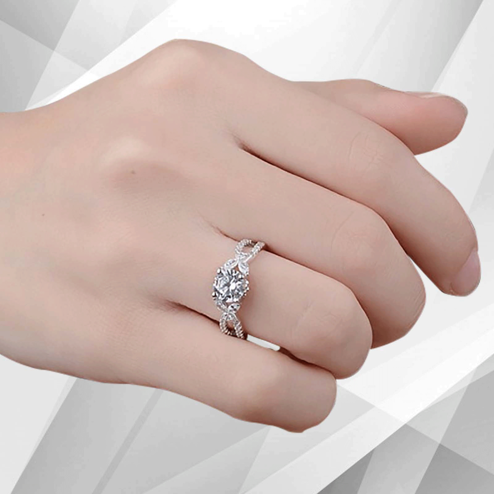 2.5Ct Round-Cut CZ Diamond Solitaire Bridal Engagement Ring set in 18K white gold, showcasing a brilliant diamond in a secure prong setting.