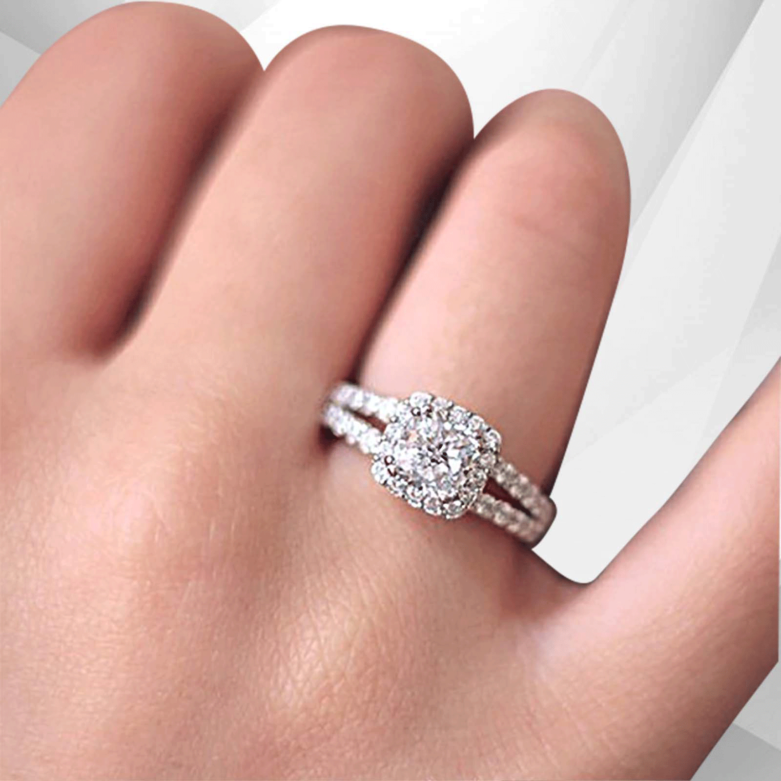 2.5Ct Round-Cut Diamond Cushion Halo Bridal Engagement Ring in 18K White Gold, showcasing a central diamond surrounded by a halo of smaller stones.