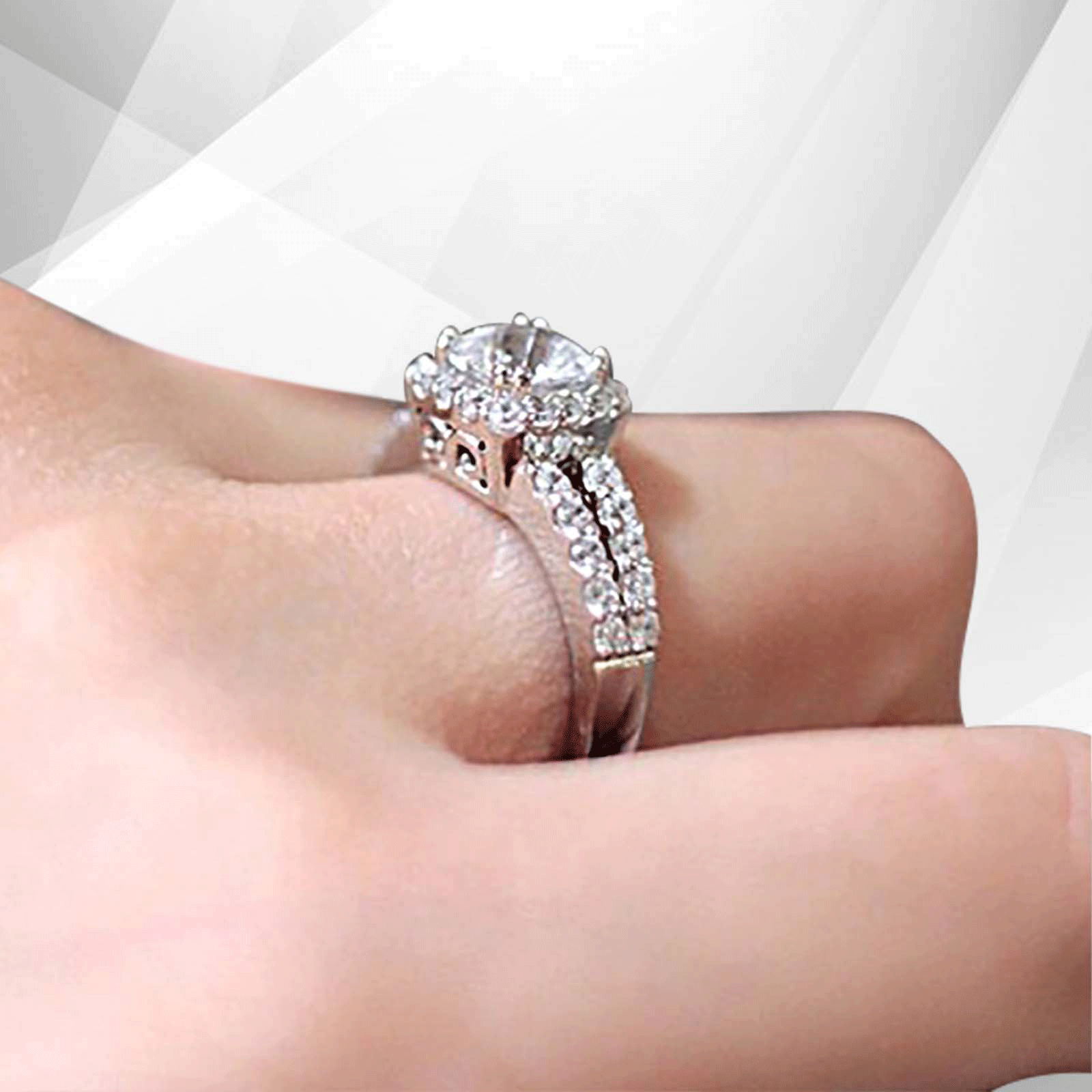 2.5Ct Round-Cut Diamond Cushion Halo Bridal Engagement Ring in 18K White Gold, showcasing a central diamond surrounded by a halo of smaller stones.