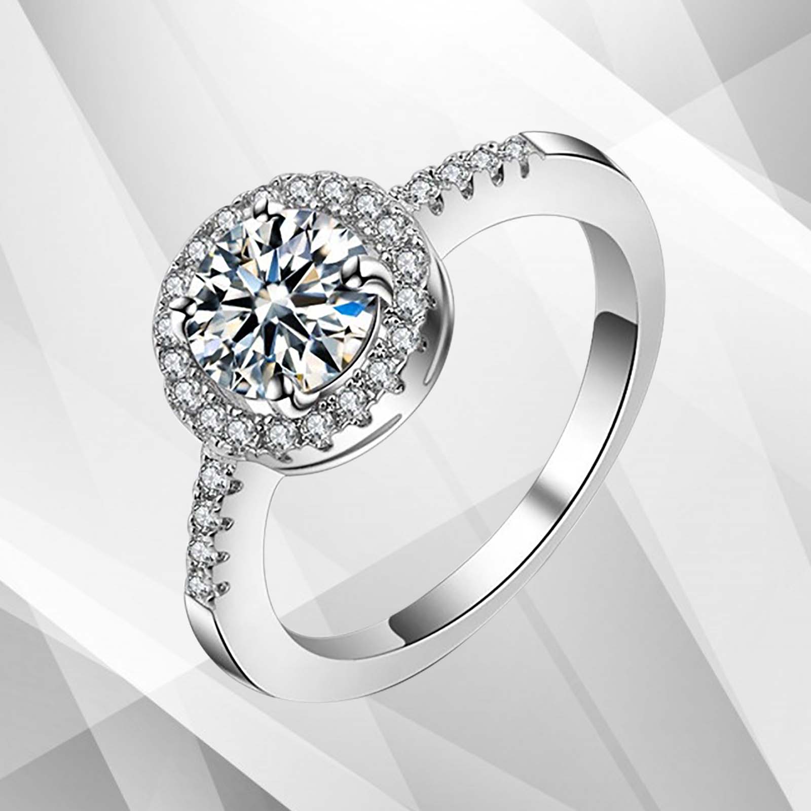 2.88Ct Large CZ Diamond Cushion Halo Bridal Engagement Ring set in 18Ct white gold over brass, featuring a round cut diamond surrounded by a halo of smaller stones.