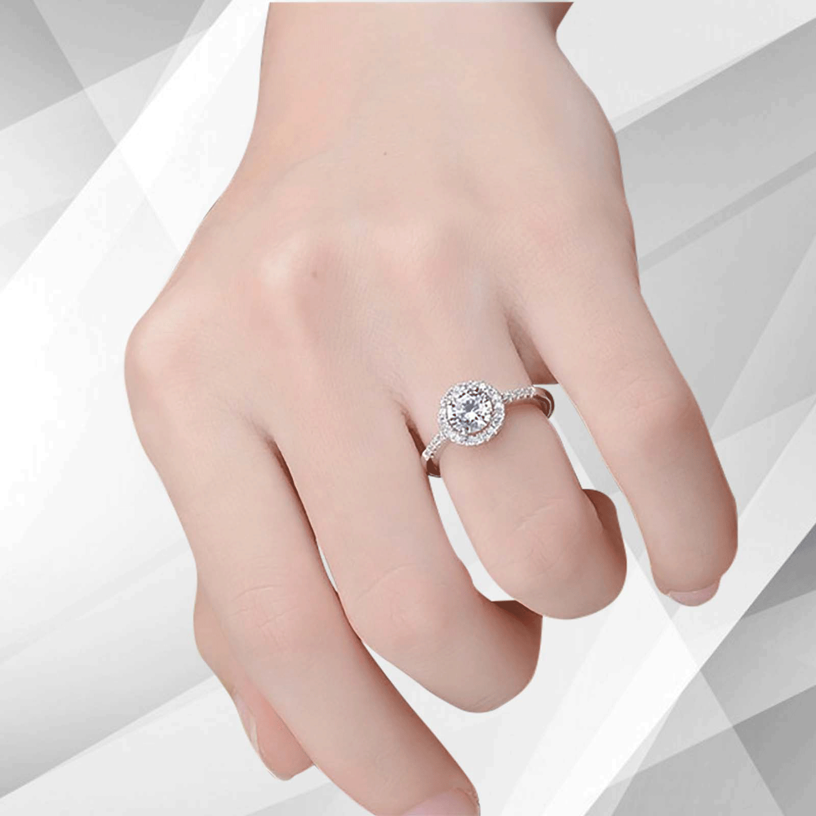 2.88Ct Large CZ Diamond Cushion Halo Bridal Engagement Ring set in 18Ct white gold over brass, featuring a round cut diamond surrounded by a halo of smaller stones.