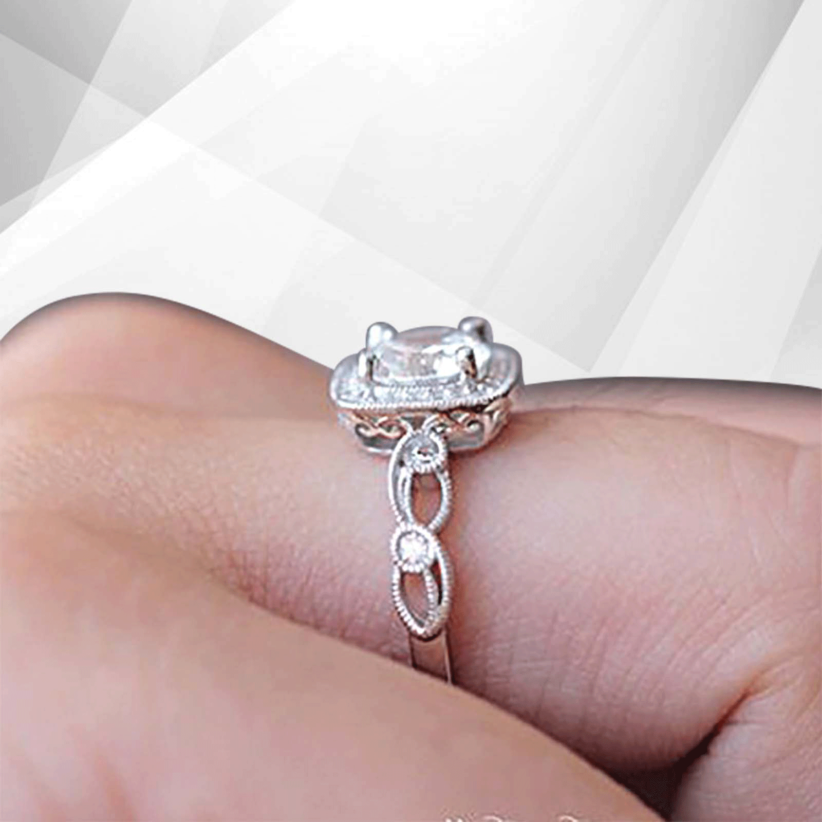 2.88Ct Large CZ Diamond Cushion Halo Engagement Ring set in 18Ct white gold, featuring a sparkling cushion halo design with round cut stones.