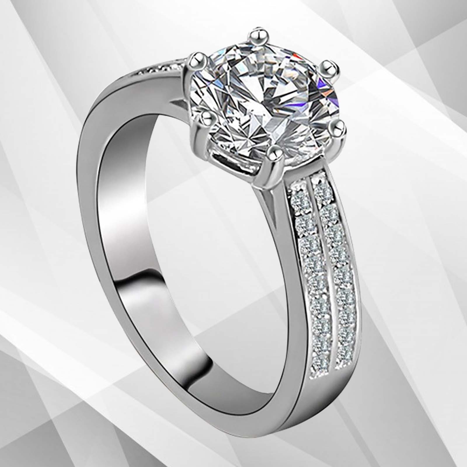 2.88Ct Round-Cut CZ Diamonds Bridal Engagement Ring in 18Ct White Gold, featuring 37 sparkling stones in a prong setting.