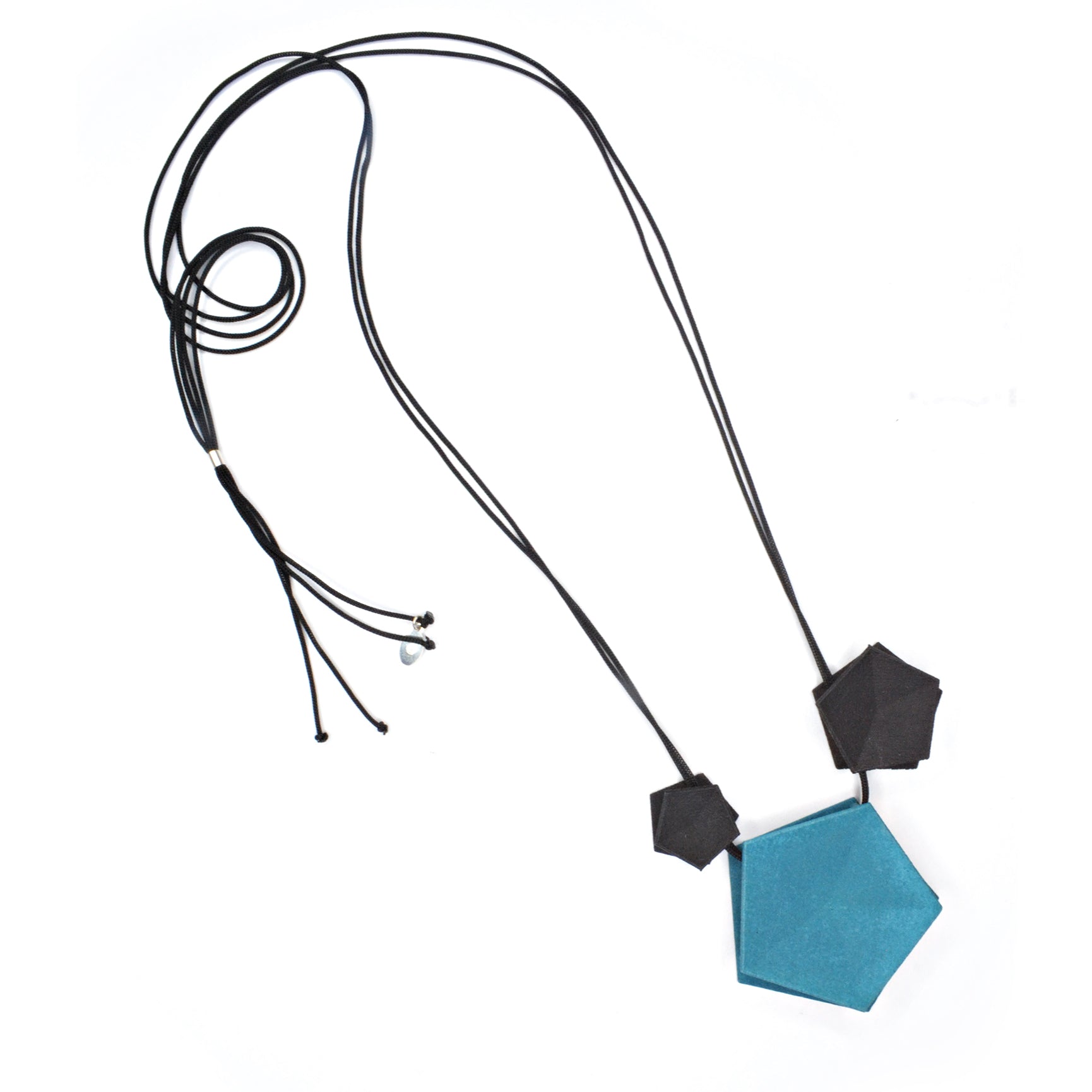 Vertigo 3 Element Necklace featuring three geometric pentagons on a black nylon cord, showcasing vibrant colors and a sterling silver bead for length adjustment.