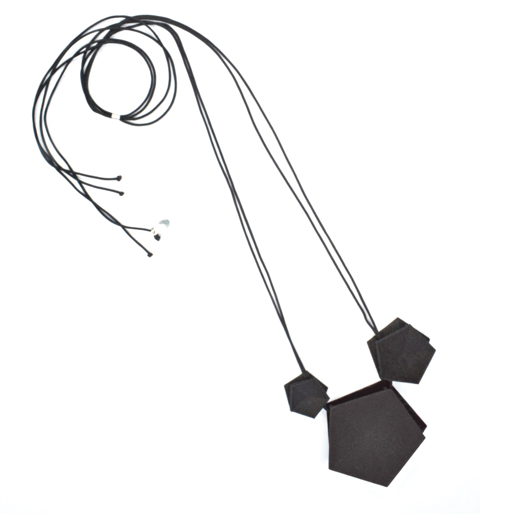 Vertigo 3 Element Necklace featuring three geometric pentagons on a black nylon cord, showcasing vibrant colors and a sterling silver bead for length adjustment.