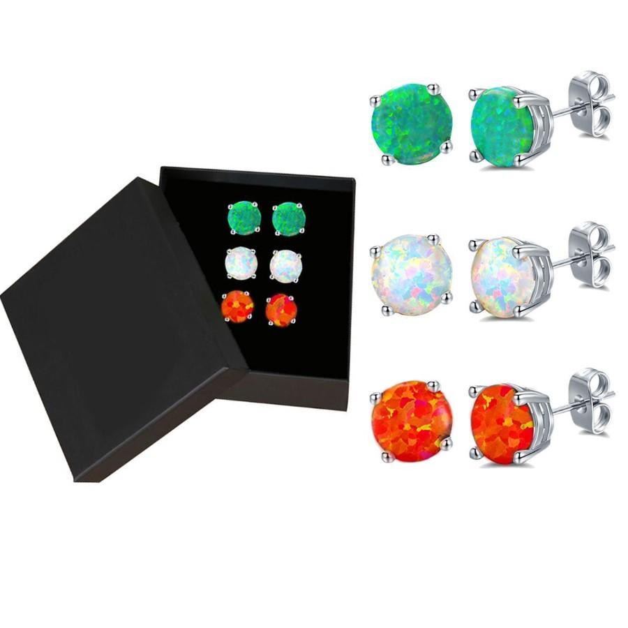 Three pairs of opal stud earrings designed in Italy, featuring 18K white gold plating and embellished with Austrian crystals.