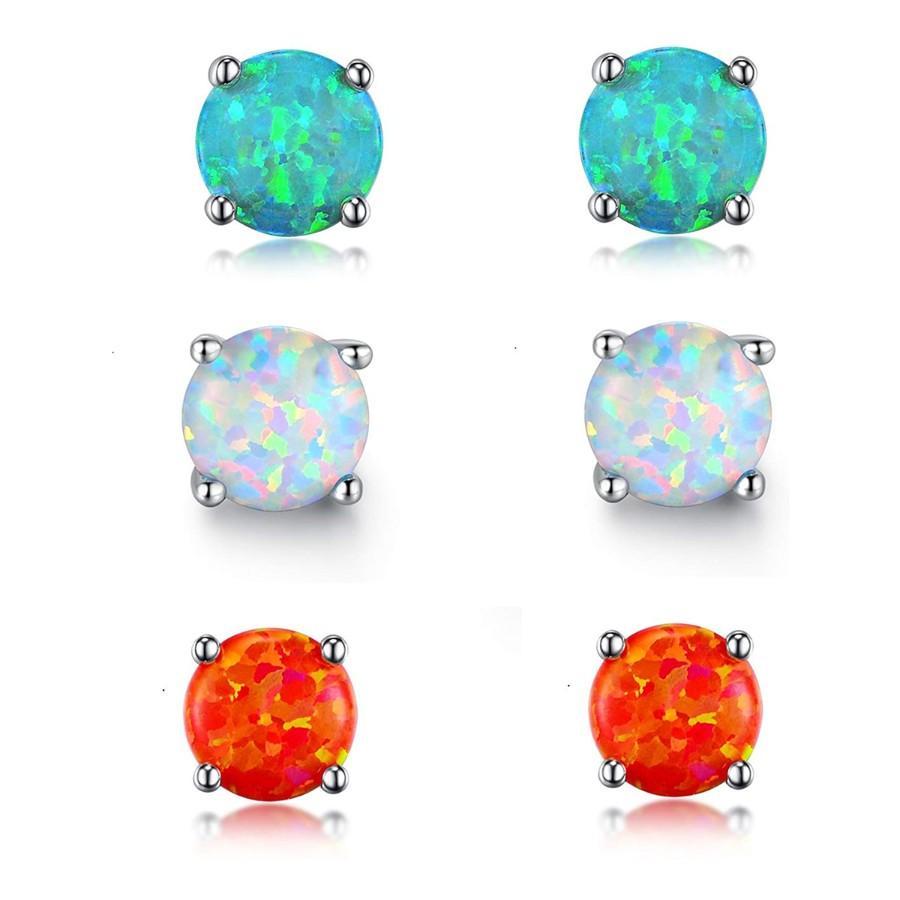 Three pairs of opal stud earrings designed in Italy, featuring 18K white gold plating and embellished with Austrian crystals.