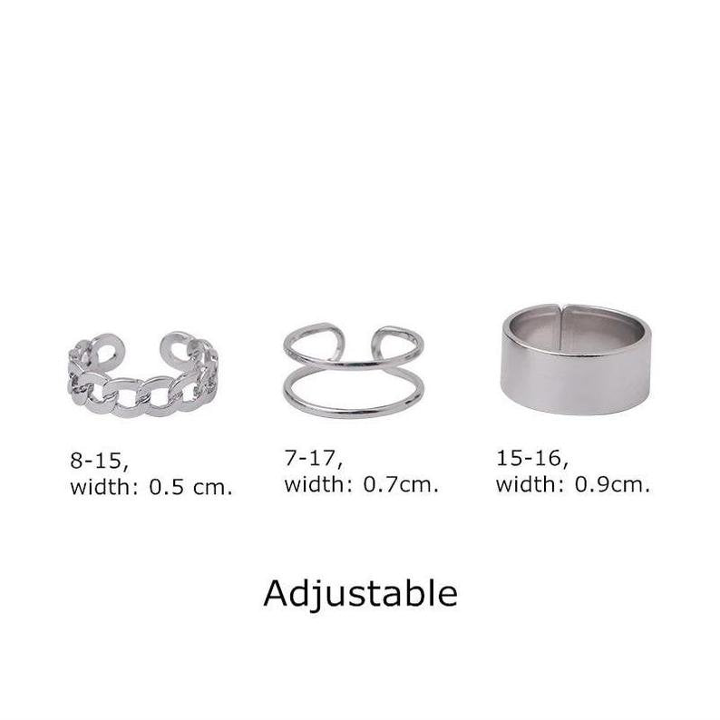 A stylish 3 Piece Adjustable Wide Band Silver Cuff Resizable Boho Ring Set displayed elegantly, showcasing unique designs and a classic silver finish.