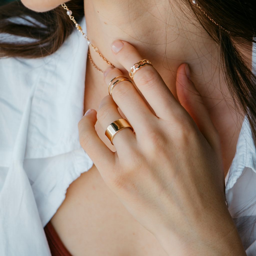 A stylish 3 Piece Adjustable Wide Band Silver Cuff Resizable Boho Ring Set displayed elegantly, showcasing unique designs and a classic silver finish.