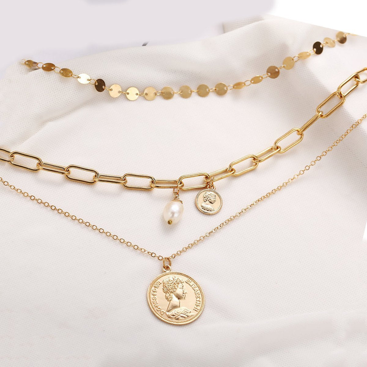 Elegant 3 Piece Coin Pearl Necklace in 18K gold plating with lobster clasp and extender.