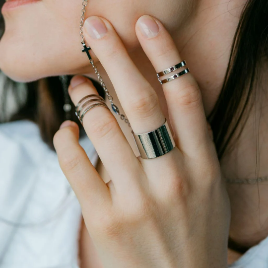 Three-piece silver adjustable thick wide band cuff ring set displayed elegantly, showcasing their boho-chic design and adjustable features.