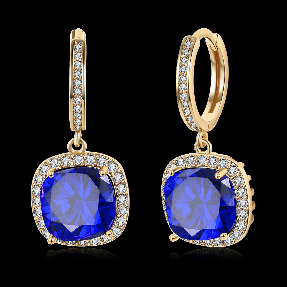 Elegant 3.00 Ct Sapphire Asscher Cut Halo Drop Earrings in 18K Gold Plated, showcasing their stunning design and vibrant sapphires.