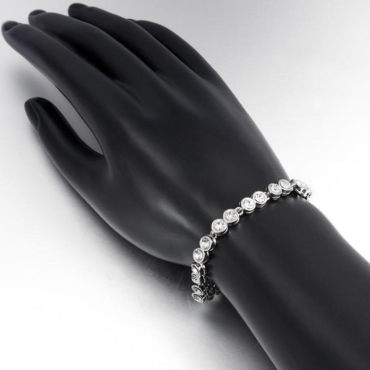 Elegant 3.00CT tennis bracelet in 18K white gold plating with sparkling crystals, showcasing its luxurious design and craftsmanship.