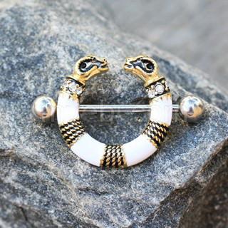 A detailed view of the 316L Stainless Steel Golden Egyptian Ram Circular Nipple Shield featuring golden ram heads, white enamel, and clear cubic zirconia.