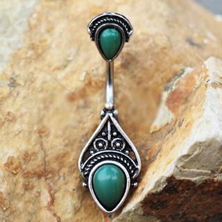 A stunning 316L stainless steel navel ring featuring a Victorian design with synthetic green stones and an antique black plating.